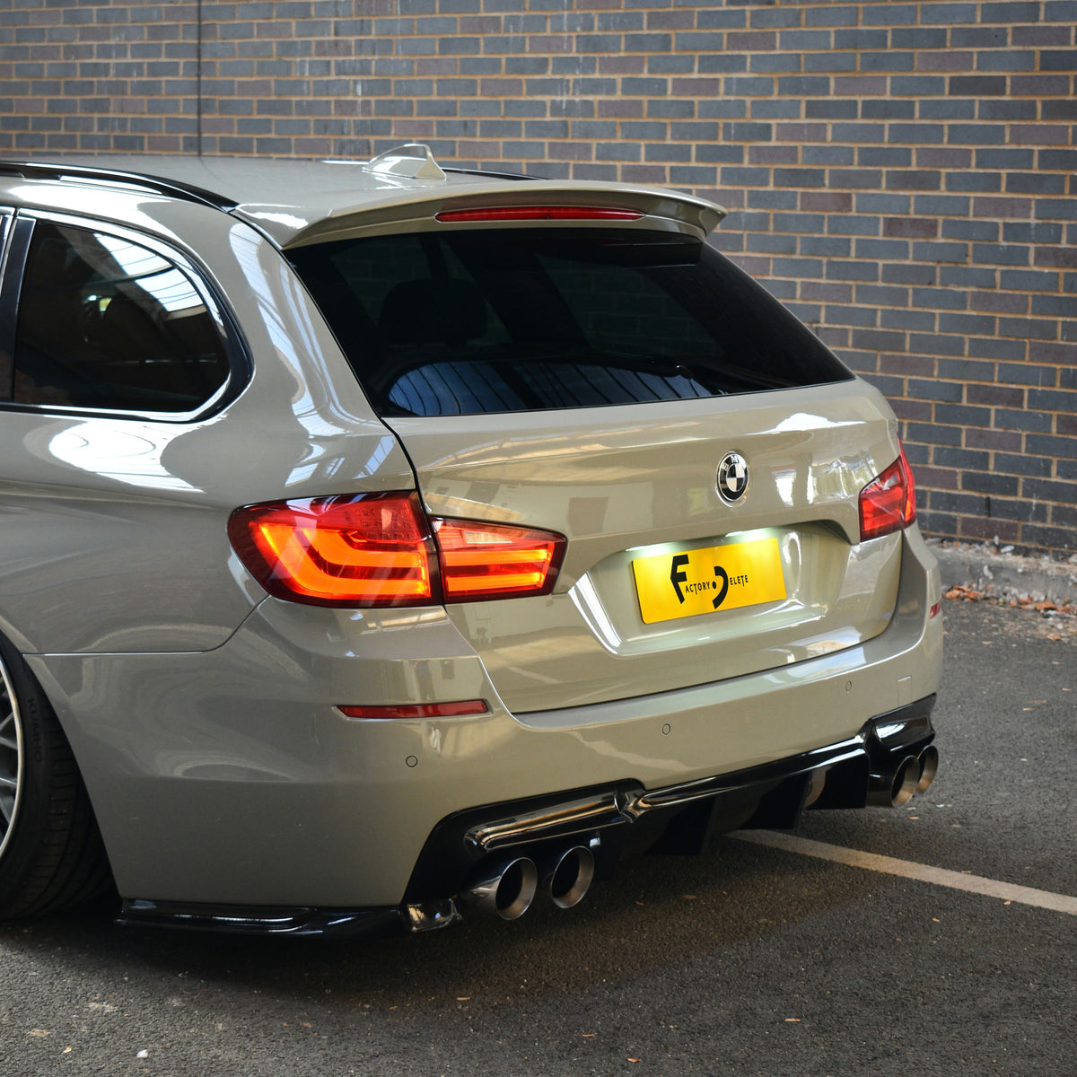 BMW F11 5 Series Touring rear, angled view with smoothed tailgate