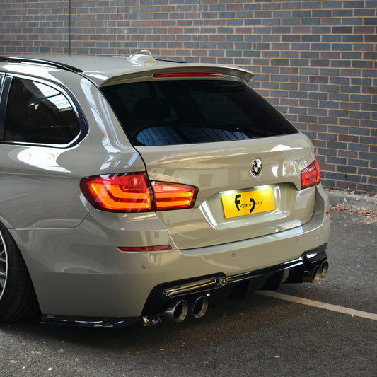 BMW F11 5 Series Touring rear, angled view with smoothed tailgate